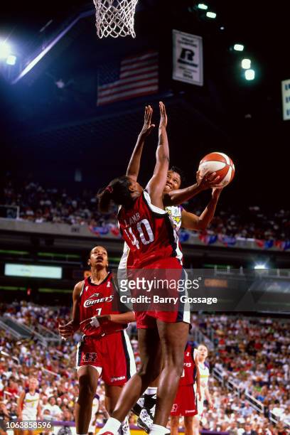 Jennifer Gillom of the Phoenix Mercury shoots during Game One of the 1998 WNBA Finals on August 27, 1998 at America West Arena in Phoenix, Arizona....
