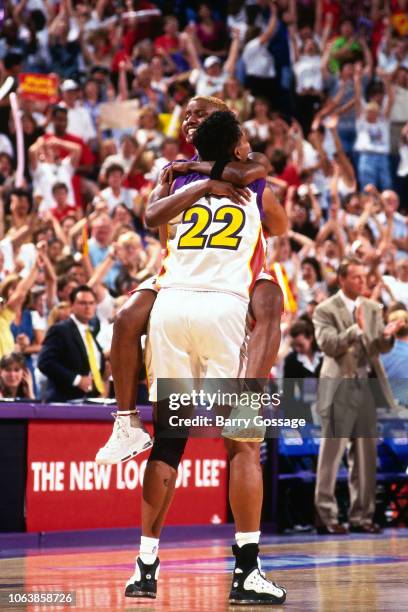 Bridget Pettis and Jennifer Gillom and Phoenix Mercury celebrate during Game One of the 1998 WNBA Finals on August 27, 1998 at America West Arena in...