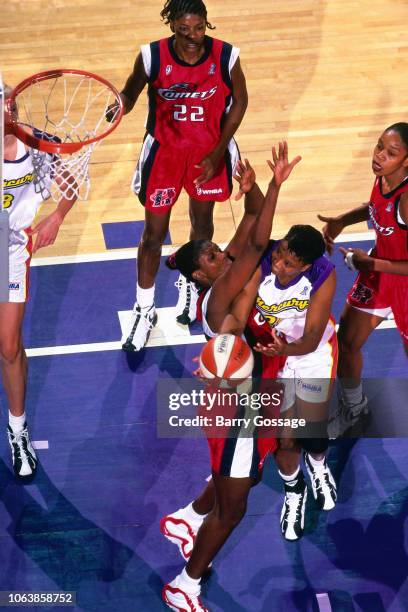 Jennifer Gillom of the Phoenix Mercury shoots during Game One of the 1998 WNBA Finals on August 27, 1998 at America West Arena in Phoenix, Arizona....