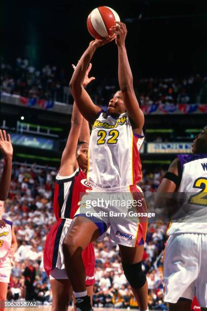 Jennifer Gillom of the Phoenix Mercury shoots during Game One of the 1998 WNBA Finals on August 27, 1998 at America West Arena in Phoenix, Arizona....