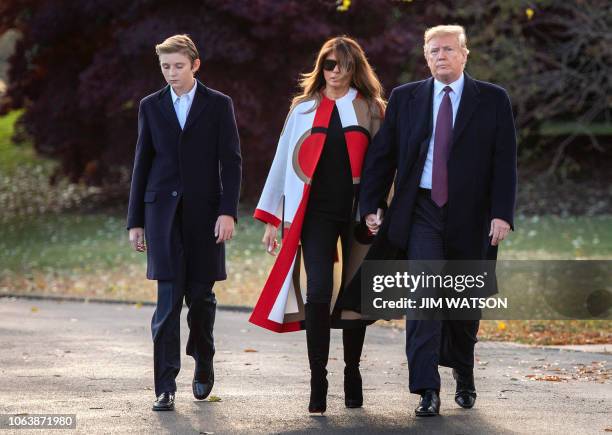 President Donald Trump , First Lady Melania Trump and their son Barron depart the White House in Washington, DC, on November 20, 2018. The Trumps are...