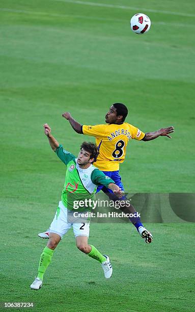 Jack Hingert of the Fury contests the ball with Anderson of the Gold Coast during the round 12 A-League match between the North Queensland Fury and...