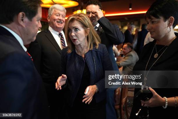 Republican U.S. Senate candidate for Tennessee Rep. Marsha Blackburn talks to Knox County Sheriff Tom Spangler during a campaign stop November 5,...