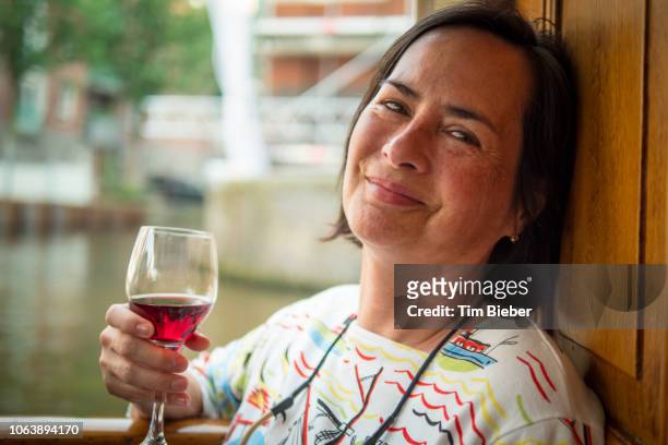 woman close up with wine - rosy cheeks fotografías e imágenes de stock