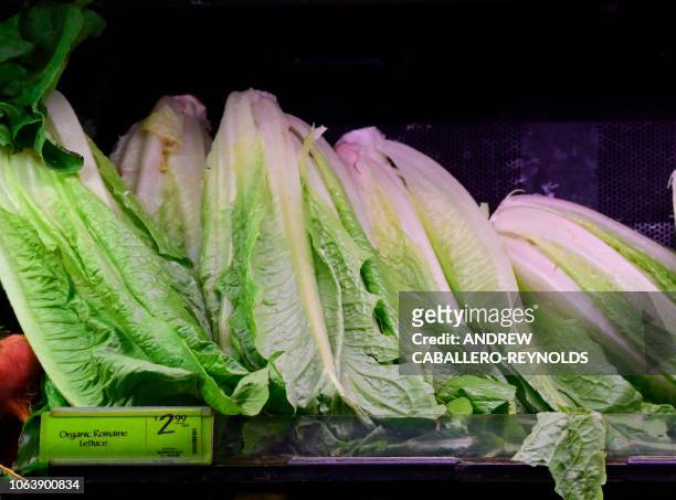 Romaine lettuce is seen on sale at a supermarket in Washington, DC on November 20, 2018. - US health officials warned consumers not to eat any...