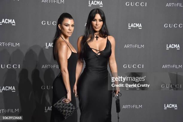 Kourtney Kardashian and Kim Kardashian attend LACMA Art + Film Gala 2018 at Los Angeles County Museum of Art on November 3, 2018 in Los Angeles, CA.
