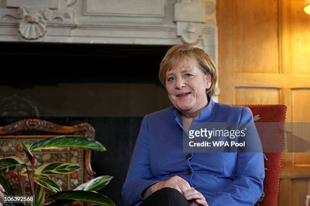 German Chancellor Angela Merkel at a meeting with British Prime Minister David Cameron at Chequers, the Prime Minister's country residence on October...