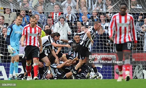 Newcastle players celebrate the first goal by Kevin Nolan during the Barclays Premier League match between Newcastle United and Sunderland at St...