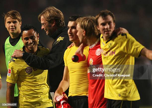 Antonio da Silva and Head coach Juergen Klopp of Dortmund celebrate the 2-0 victory after the Bundesliga match between FSV Mainz 05 and Borussia...