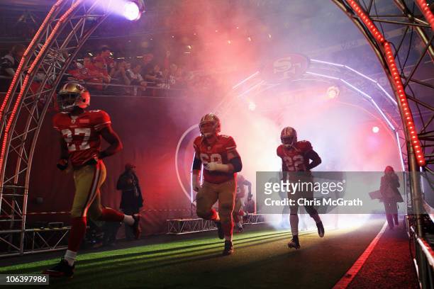 San Francisco 49ers team emerge from the players tunnel before the NFL International Series match between Denver Broncos and San Francisco 49ers at...