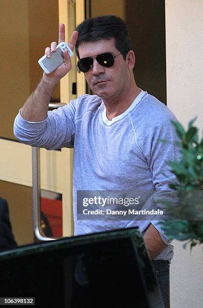 Factor judge Simon Cowell is seen at the 'X Factor' studio for the live filming of the show on October 31, 2010 in London, England.