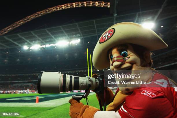 San Francisco 49ers Sourdough Sam jokes with a camera during the NFL International Series match between Denver Broncos and San Francisco 49ers at...