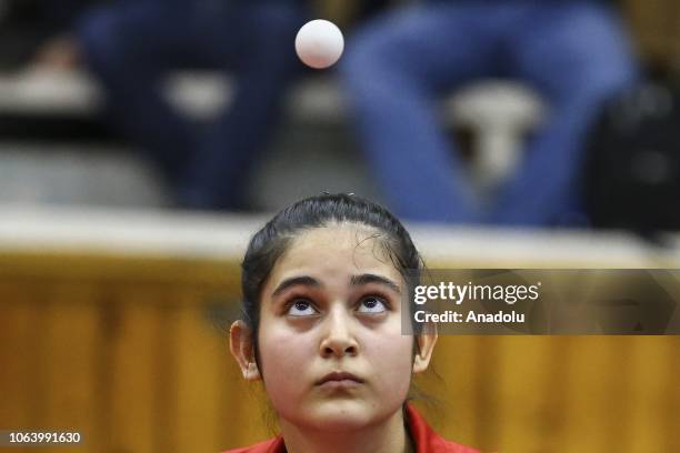 Betul Nur Kahraman of Turkey in action against Mie Skov of Denmark during women's singles table tennis match on last day of B2 Group within the 2019...