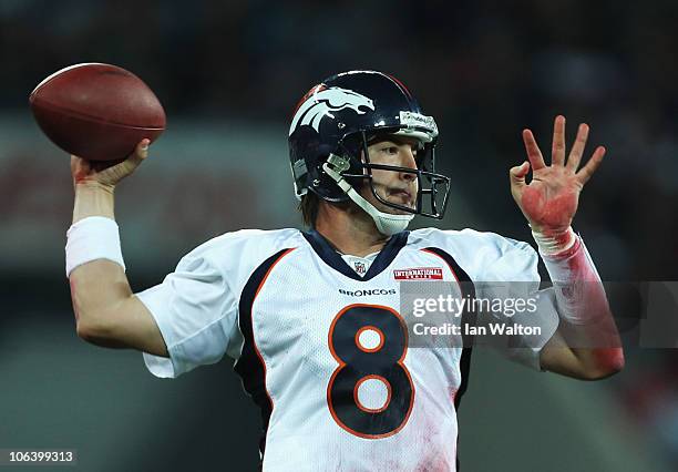 Kyle Orton of Denver Broncos prepares to release the ball during the NFL International Series match between Denver Broncos and San Francisco 49ers at...