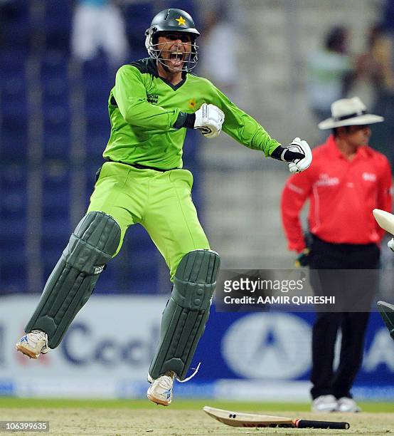 Pakistani cricketer Abdul Razzaq jumps in the air as he celebrates after winning the second day-night international match against South Africa at the...