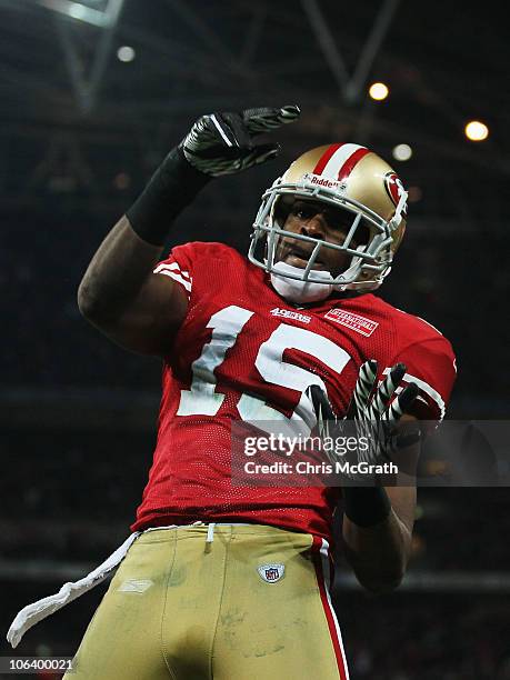 Michael Crabtree of San Francisco 49ers celebrates as he scores their second touchdown during the NFL International Series match between Denver...