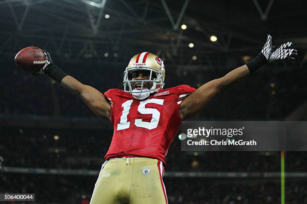Michael Crabtree of San Francisco 49ers celebrates as he scores their second touchdown during the NFL International Series match between Denver...