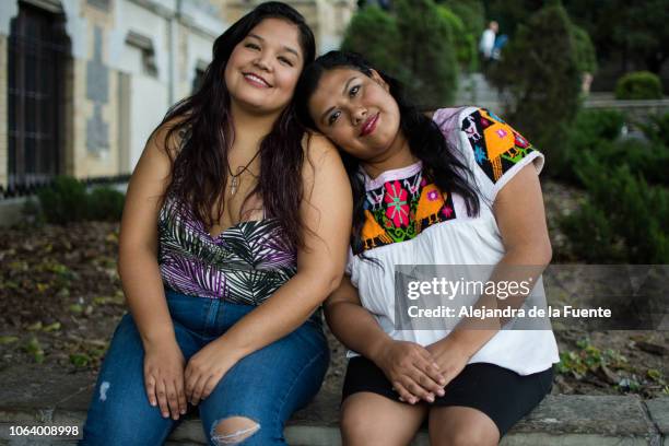 two friends hanging out at the park - monterrey mexico stock pictures, royalty-free photos & images