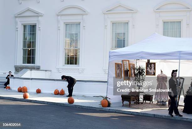 Entertainers prepare for trick or treaters out side the White House October 31, 2010 in Washington, DC. President Obama and first lady Michelle Obama...