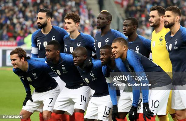 French players, first rank: Antoine Griezmann, Blaise Matuidi, Ngolo Kante, Ferland Mendy, Kylian Mbappe back rank: Adil Rami, Benjamin Pavard,...