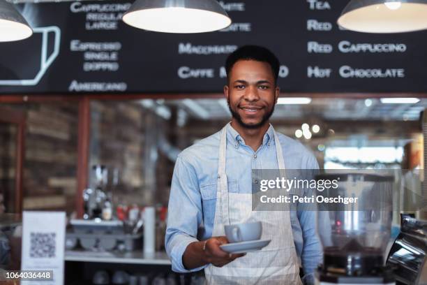 a coffee shop owner at work. - barista coffee restaurant stockfoto's en -beelden