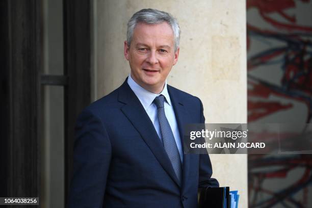 French Economy Minister Bruno Le Maire leaves the Elysee presidential Palace after the weekly cabinet meeting, on November 21 in Paris.