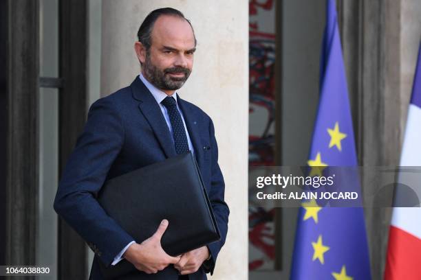 French Prime Minister Edouard Philippe leaves the Elysee presidential Palace after the weekly cabinet meeting, on November 21 in Paris.