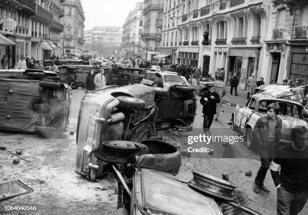 Turned over cars cover Gay-Lussac street on the morning of May 11, 1968 after violent fights between students and police during the night of May...