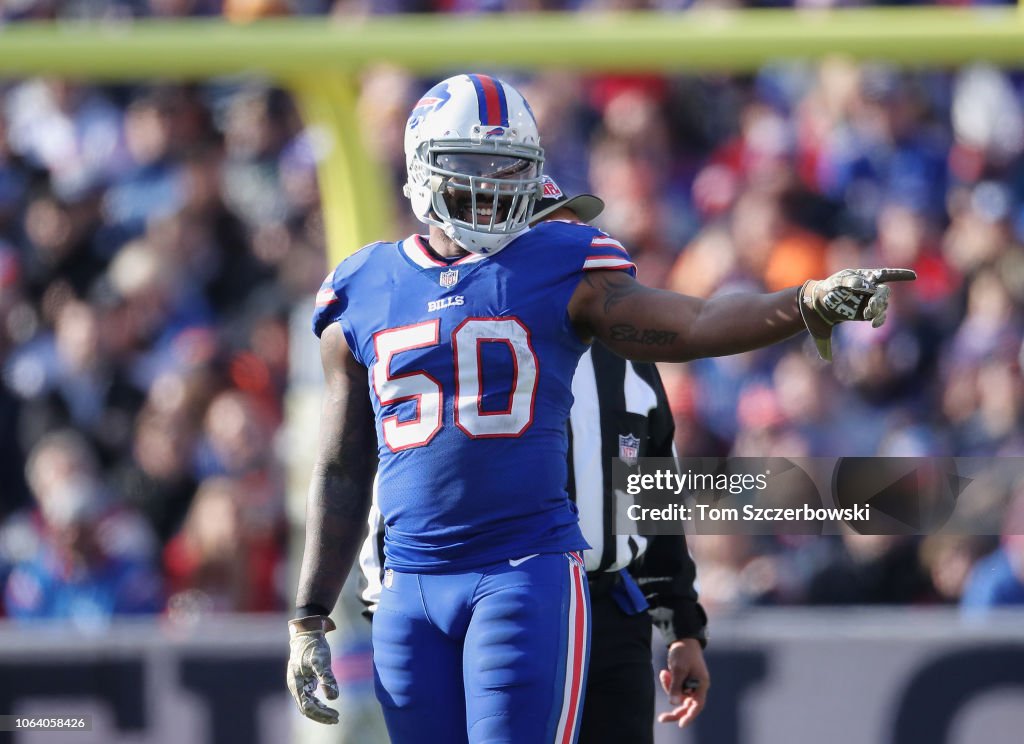 Ramon Humber of the Buffalo Bills points during NFL game action... News