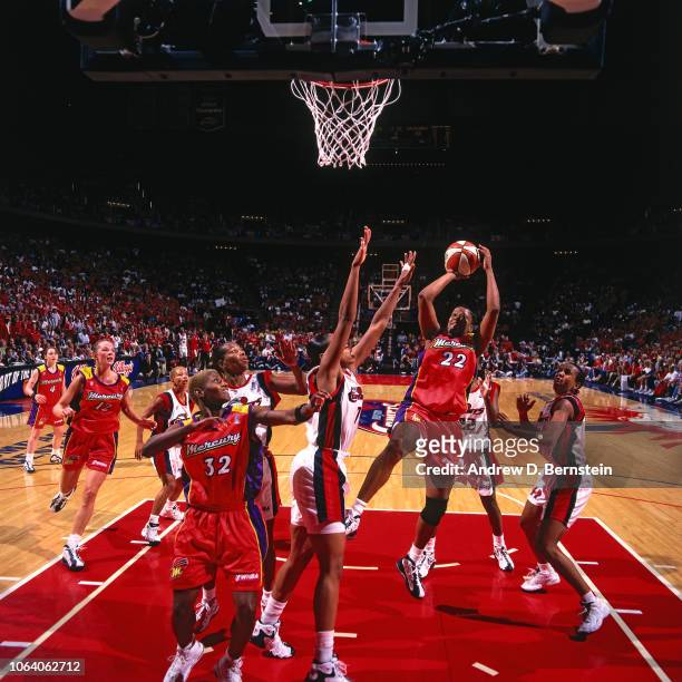 Jennifer Gillom of the Phoenix Mercury shoots during Game Three of the 1998 WNBA Finals on September 1, 1998 at the Compaq Center in Houston, Texas....