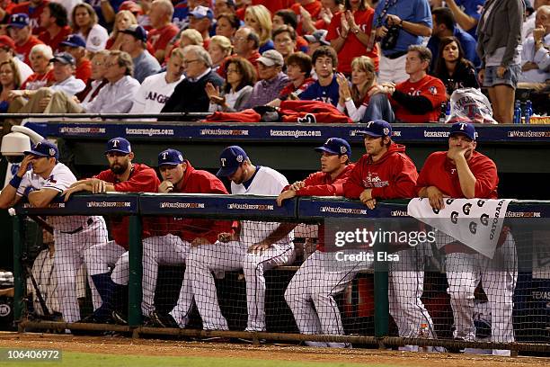 Players from the Texas Rangers looks on dejected form the dugout late in the game against the San Francisco Giants in Game Four of the 2010 MLB World...