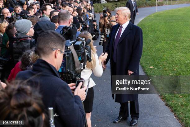 President Donald Trump speaks to members of the press prior to his departure from the White House in Washington, DC., on Tuesday, November 20, 2018....