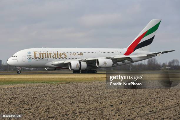 Emirates Airbus A380-800 landing in Amsterdam Schiphol Airport in The Netherlands. The aircraft has the registration A6-EDF and is flying since...