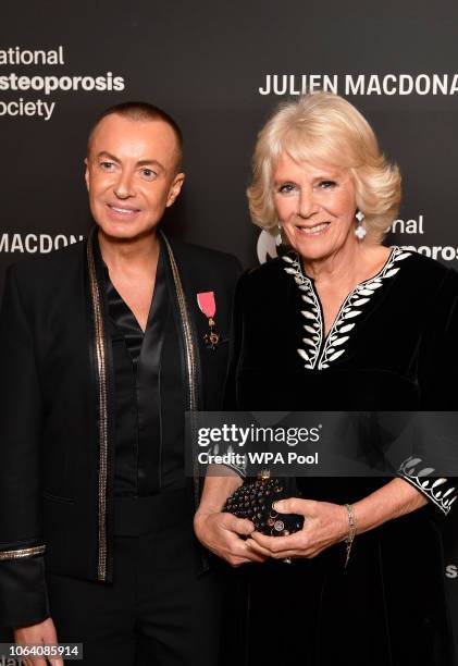 Julien Macdonald and the Duchess of Cornwall at the Julien Macdonald Fashion Show Reception at Lancaster House in London, which is supporting the...