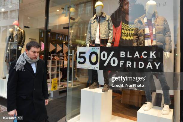 Sales and reductions signs seen around Grafton Street shops ahead of Black Friday, regarded as the beginning of the Christmas shopping season. Major...