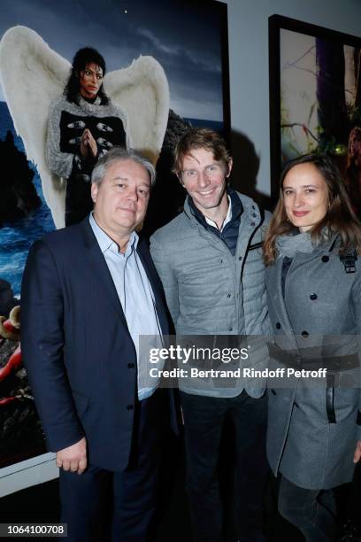 Raoul Salomon, Star Dancer Karl Paquette and his wife Marion attend the Inauguration of the Exhibition "Michael Jackson : On The Wall" at Grand...