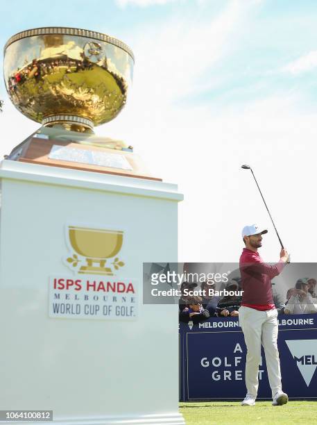 Kyle Stanley of the United States tees off on the first hole next to the winners trophy during day one of the 2018 World Cup of Golf at The...