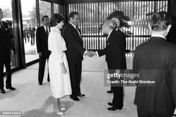 Egyptian President Hosni Mubarak and his wife Suzanne are escorted by Emperor Hirohito prior to their meeting at the Imperial Palace on April 6, 1983...