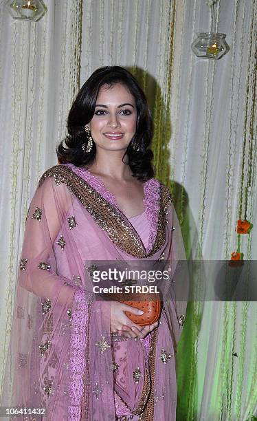 Indian Bollywood actress Dia Mirza attends newly wed Vivek Oberoi and Priyanka Alva's reception party late night October 31, 2010 in Mumbai. AFP...