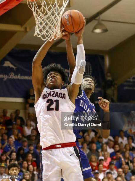 Rui Hachimura of the Gonzaga Bulldogs is fouled in the act of shooing by Cam Reddish of the Duke Blue Devils during the second half of the game at...