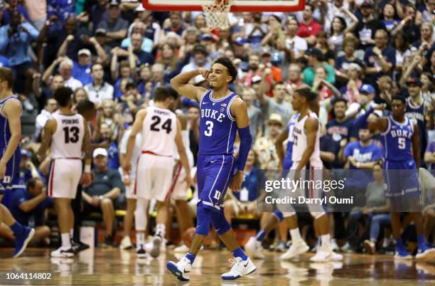 Tre Jones of the Duke Blue Devils flexes his biceps after a hard fough basket during the second half of the game against the Gonzaga Bulldogs at the...