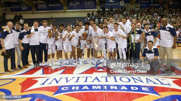 The Gonzaga Bulldogs players and coaches pose for a photo after winning the 2018 Maui Invitational against the Duke Blue Devils at the Lahaina Civic...