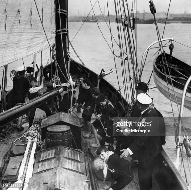 Sea Scouts hard at work on board the vessel given to them by The Daily Mirror. September 1912.