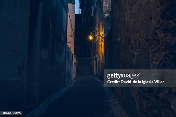 streets of lisbon at night - cultura portoghese foto e immagini stock