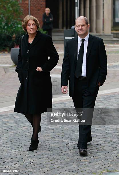 German Social Democrat Olaf Scholz and his wife Britta Ernst arrive for the memorial service for Loki Schmidt, wife of former German Chancellor...