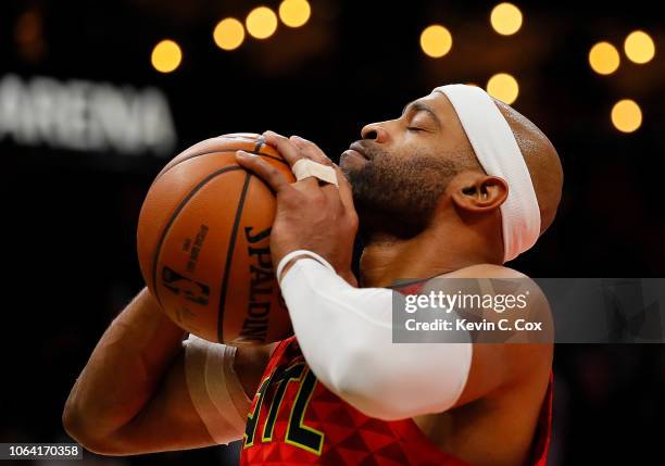 Vince Carter of the Atlanta Hawks reacts after scoring his 25,000th NBA point in the final seconds of their 124-108 loss to the Toronto Raptors at...