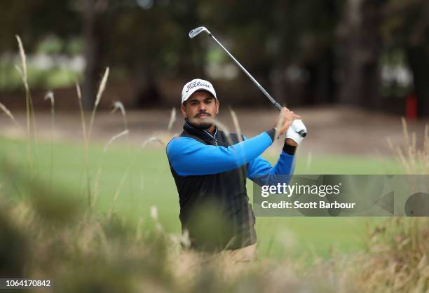 Gaganjeet Bhullar of India plays a shot on the 9th hole during day one of the 2018 World Cup of Golf at The Metropolitan on November 22, 2018 in...