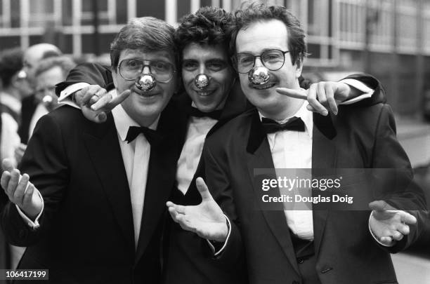 Radio DJ's Simon Bates, Gary Davies and Steve Wright promote Comic Relief's Red Nose Day on March 10, 1989.