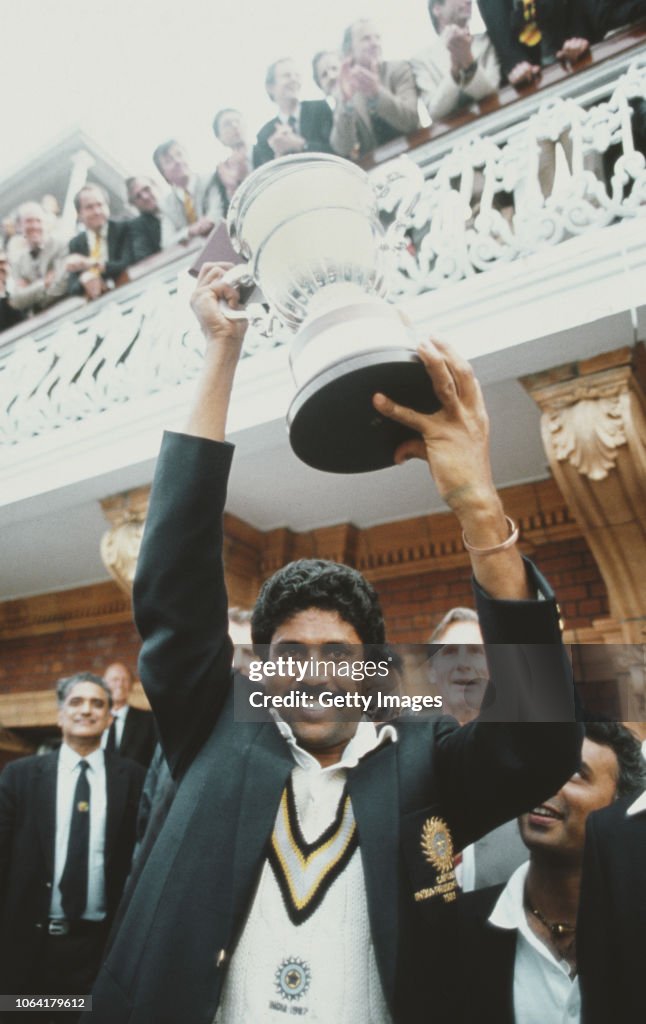 India Captain Kapil Dev holds aloft the 1983 Cricket World Cup