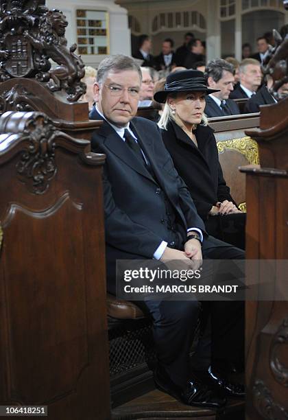 Hamburg's Mayor Christoph Ahlhaus and his wife Simone attend the funeral service of Hannelore "Loki" Schmidt at the Sankt Michaelis church in...